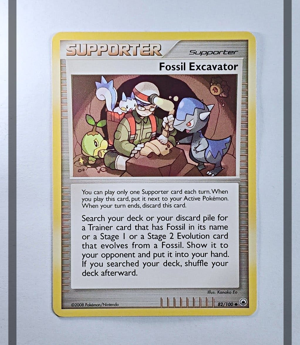 Fossil Excavator 82/100 MD Pokemon ENG-LP