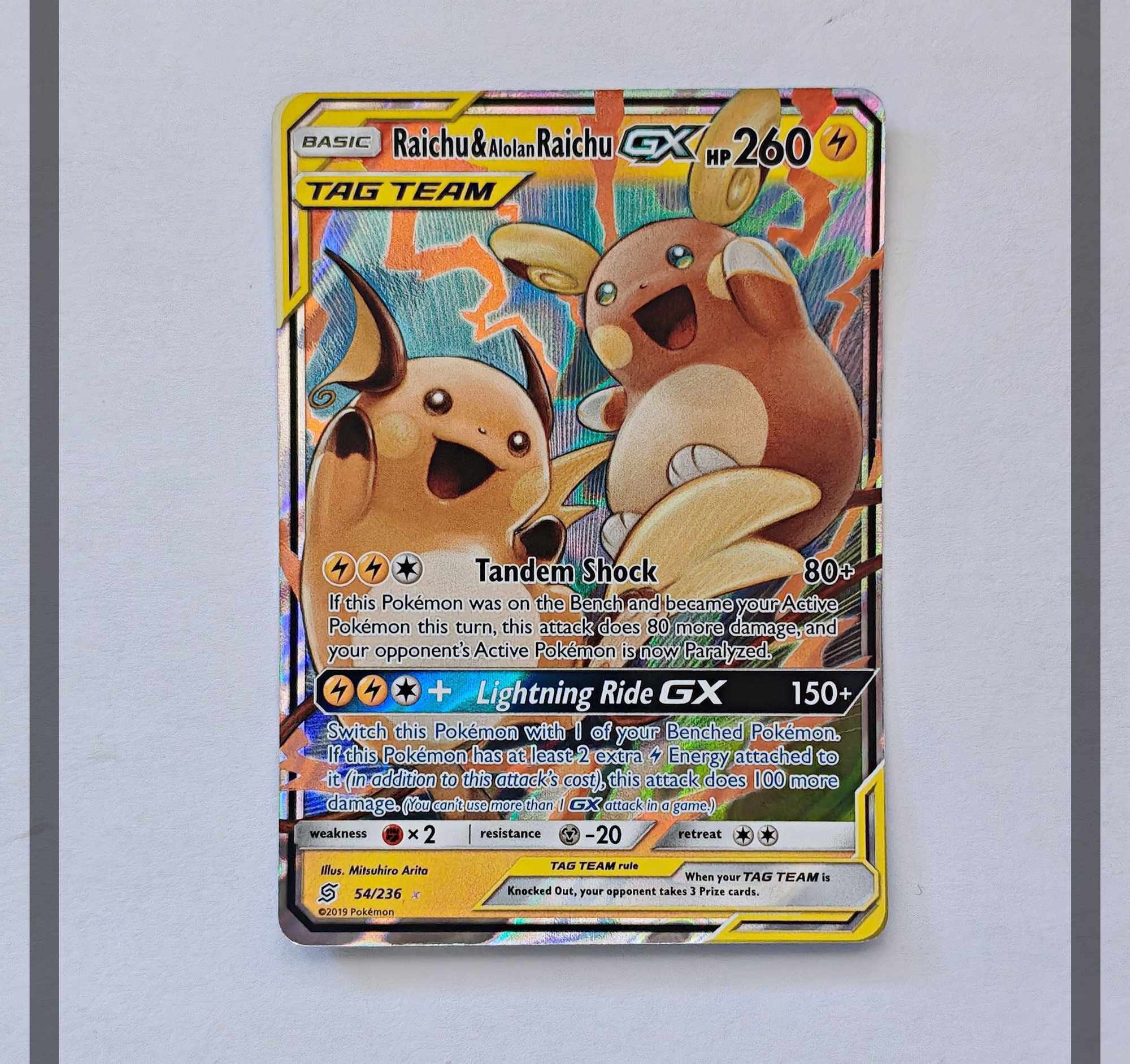 Raichu & Alolan Raichu Gx 54/236 UNM Pokemon ENG